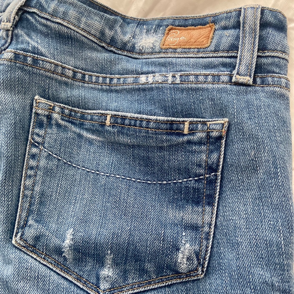 PAIGE “Skyline” distressed light wash ankle jeans